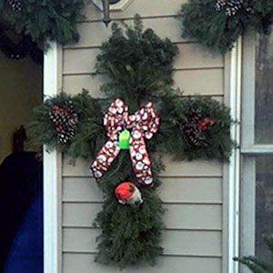 Decorated Christmas evergreen cross.