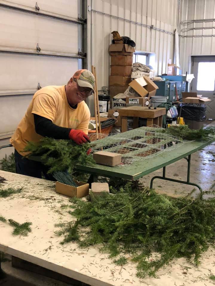 wreath-making on site at Designer Landscapes