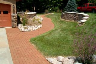 Walkway, cobblestone and layered rock